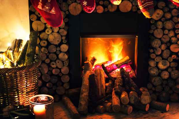 brown beside fireplace near brown wicker basket
